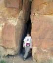 Carolyn in the rocks at Chaco Canyon